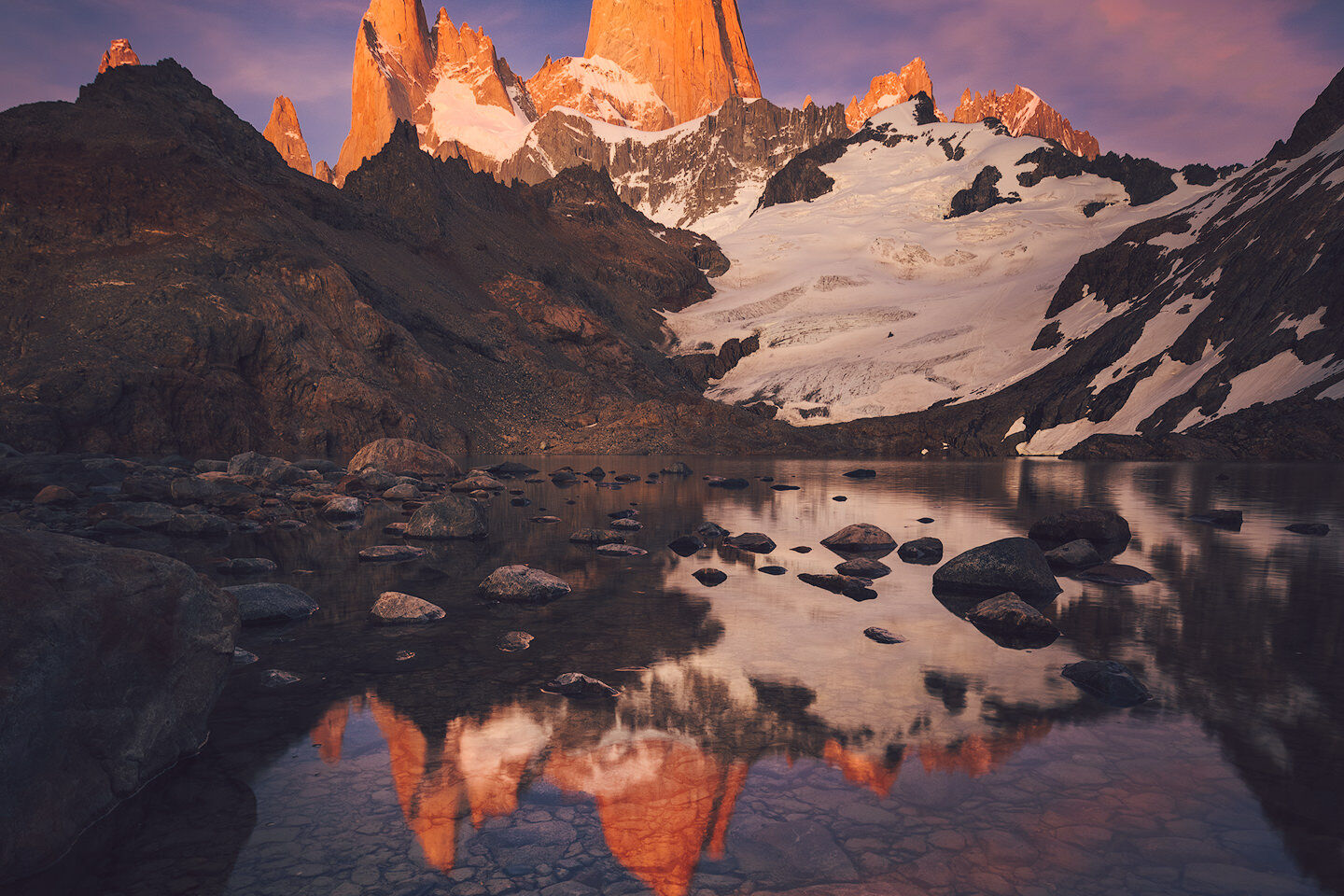Fitz Roy reflected in Laguna de los Tres at sunrise.